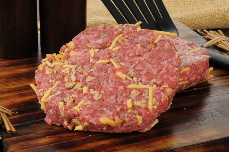 Hamburger Patties with Cheese and Bacon Stock Image - Image of pepper