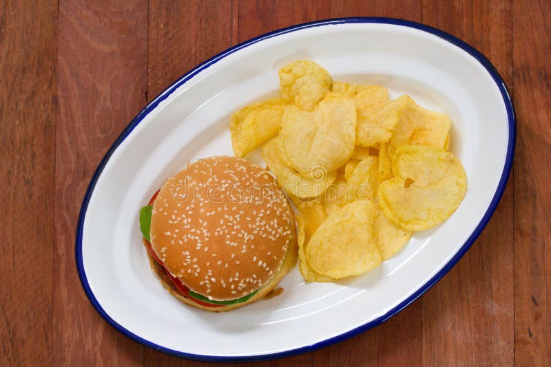 Hamburger With Potato Chips On White Dish Stock Photo Image of meal