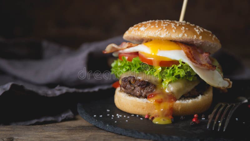 Hamburger with Scrambled Eggs Stock Photo - Image of cheeseburger, meat