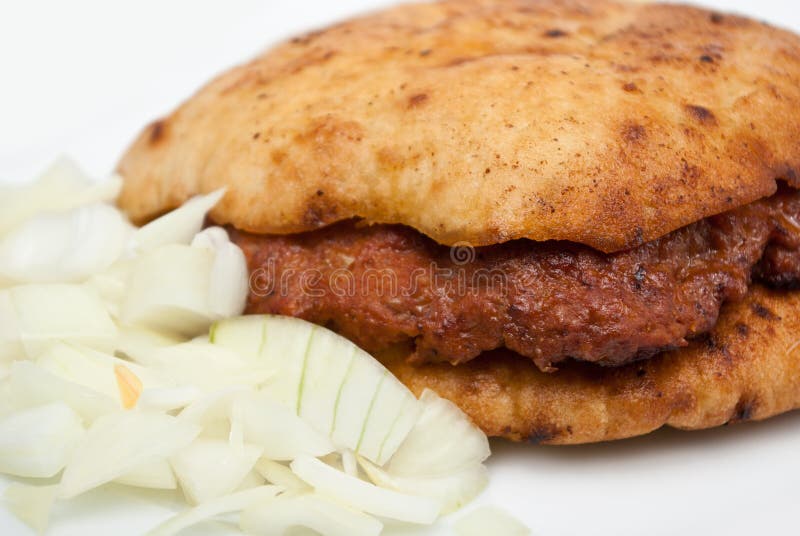 Hamburger steak in flatbread (lepinja) with onion