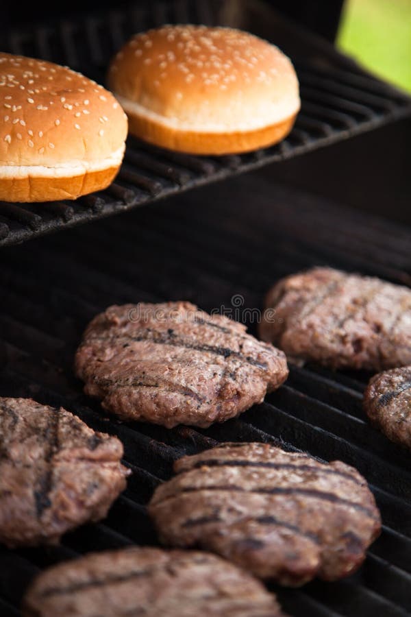 Hamburgers on the grill stock image. Image of patty, grilling 31175993