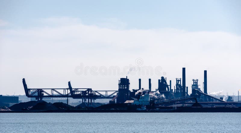 Large factories and industrial machines near waterfront in Hamilton, Ontario, Canada royalty free stock image Large factories and industrial machines near waterfront in Hamilton, Ontario, Canada royalty free stock image