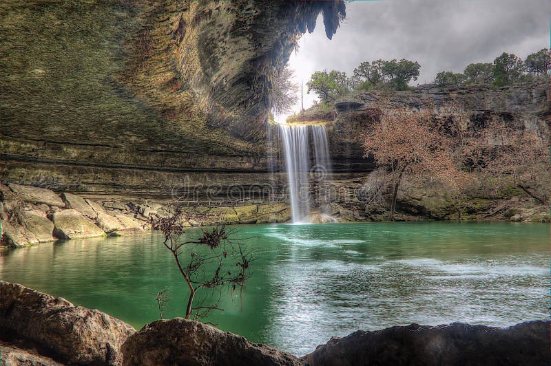 Waterfall at Hamilton Pool near Austin Texas on a cloudy day. Waterfall at Hamilton Pool near Austin Texas on a cloudy day.