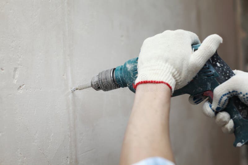 Hammer drills wall stock photo. Image of housework, home 15915860