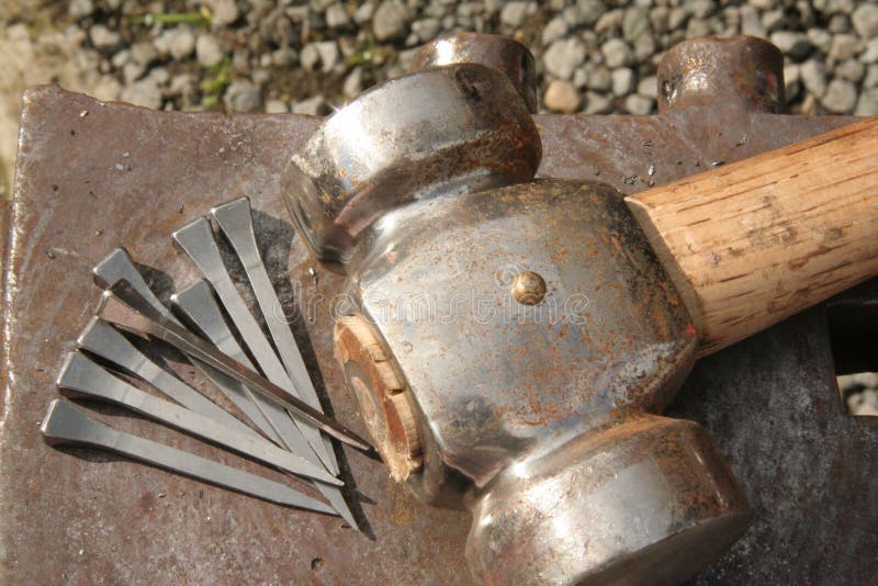 Hammer and horseshoe nails stock image. Image of tool 1154595