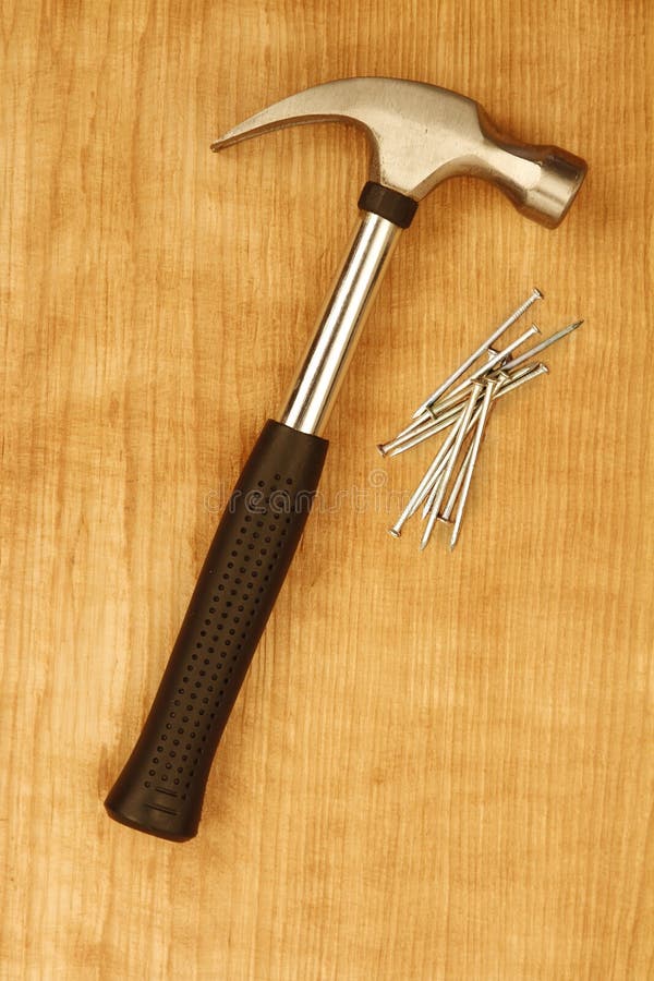 Hammer, nails and wood stock photo. Image of isolates 20975086