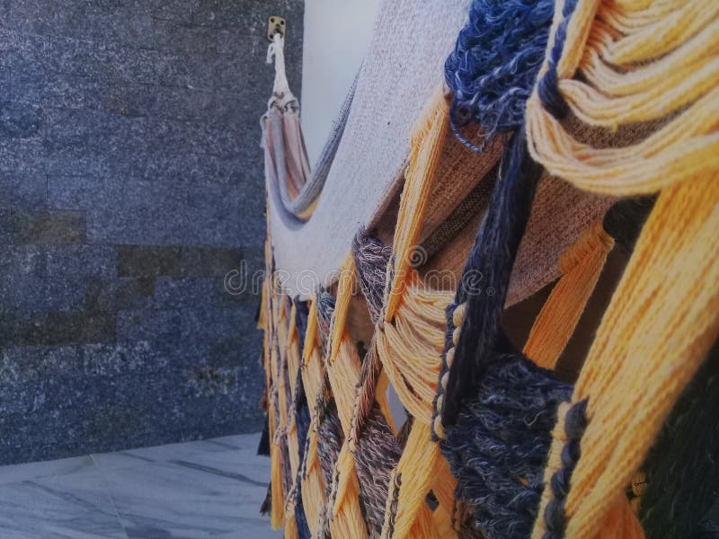 Hammock on the balcony with stone wall behind stock images Hammock on the balcony with stone wall behind stock images