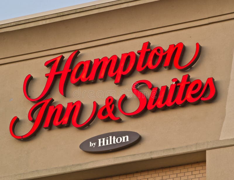 Hampton Inn- u. Reihen-Zeichen stockbild Hampton Inn- u. Reihen-Zeichen stockbild