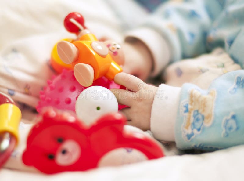 Close up hand with baby toys. Body cam stock images, royalty-free photos and pictures