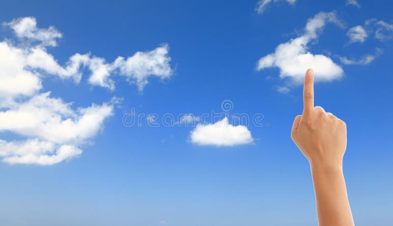 Hand with blue sky and white cloud stock image