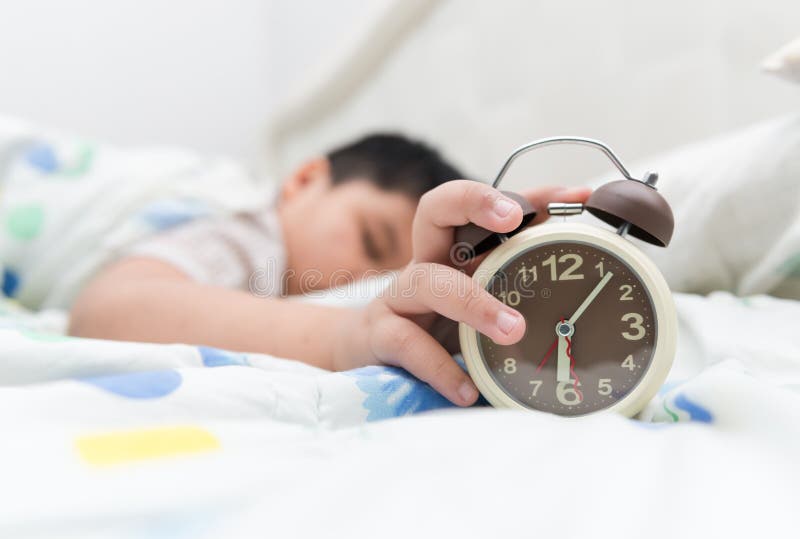 Hand Boy Reaching Out for Alarm Clock Stock Image Image of alarm
