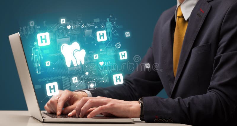 Hand browsing on the internet for medical issues stock photo