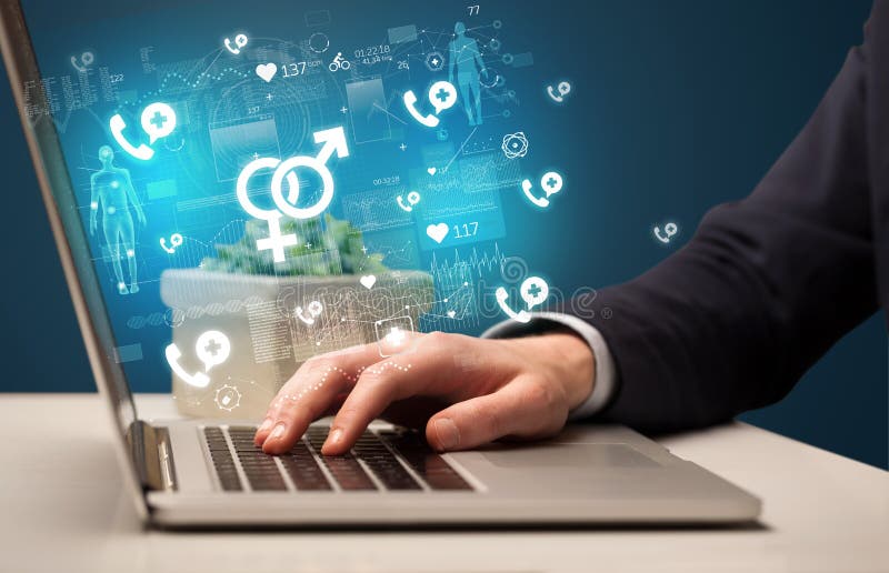 Hand browsing on the internet for medical issues stock image