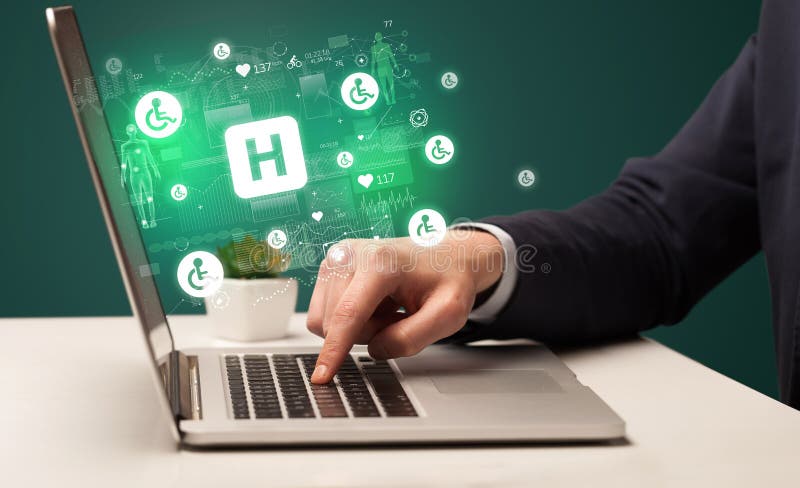 Hand browsing on the internet for medical issues stock photos