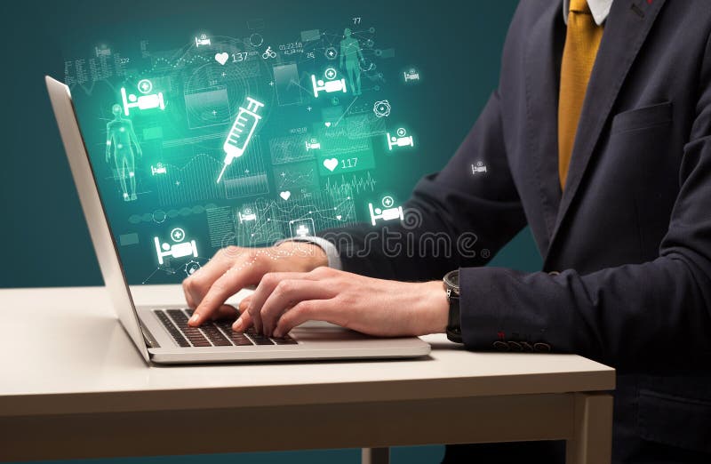 Hand browsing on the internet for medical issues stock image