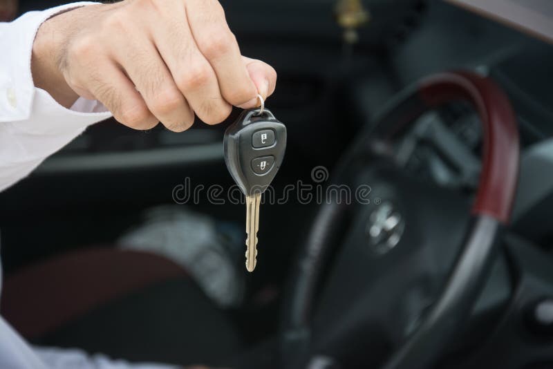 Hand with a car keys in car royalty free stock images Hand with a car keys in car royalty free stock images