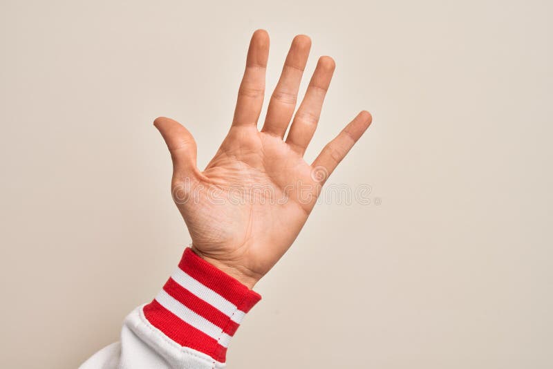 Closeup Of Male Hand Holding Five Fingers Up High-Res Stock Photo