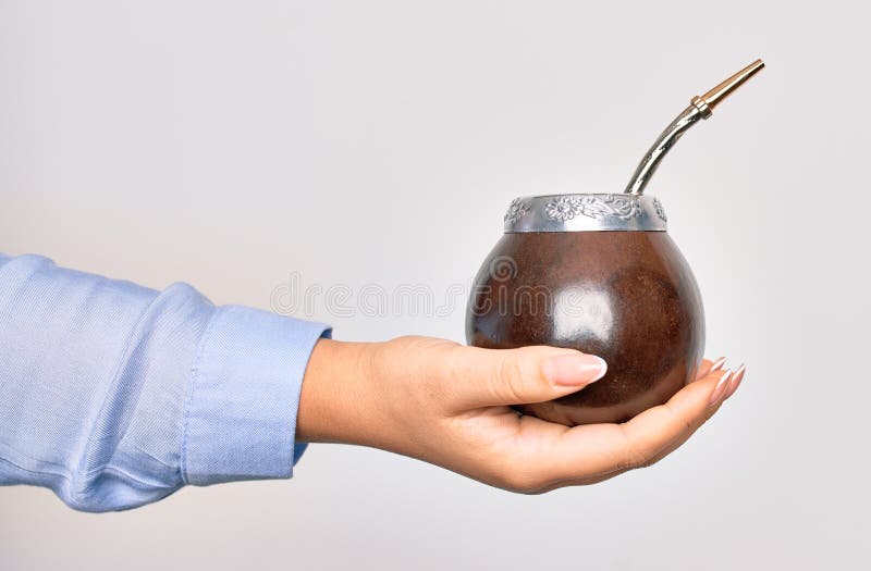 Vertical closeup of a cup of yerba mate infusion with a thermos Stock Photo  - Alamy