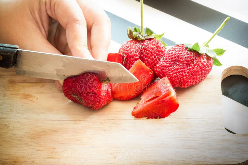 Hand Chopping a Fresh Strawberry Stock Image Image of girl