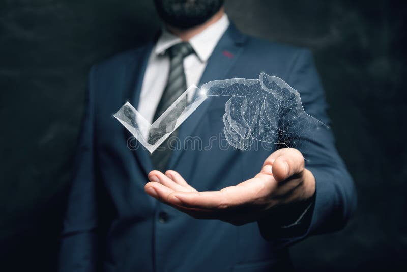 The Hand Clicks on the Check Mark from the  Stock Image Image of