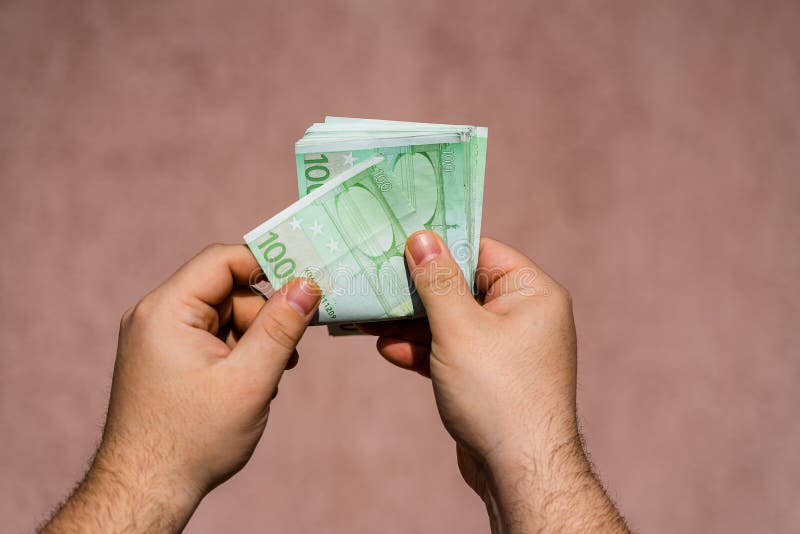 Hand Counting Money, a Stack of 100 Euro Banknotes Stock Image Image