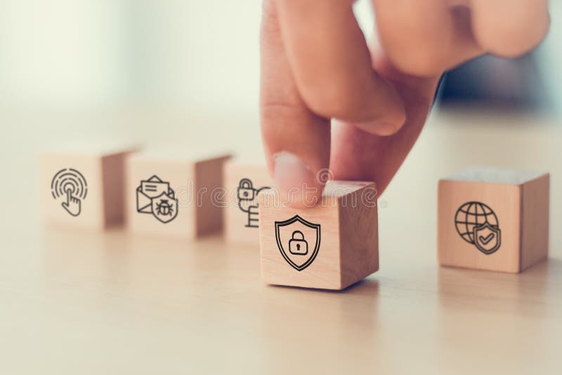 Hand with cybersecurity icons on wooden blocks. Advanced technology, artificial intelligence, online privacy, data protection, security payment, network security, access control and SSL. Shield artificial intelligence stock images, royalty-free photos and pictures