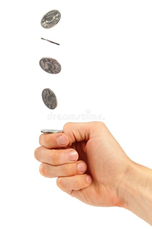 Hand, die eine Münze leicht schlägt stockbild