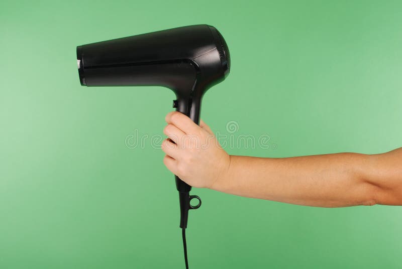 Hand, die Haartrockner hält stockfoto Hand, die Haartrockner hält stockfoto