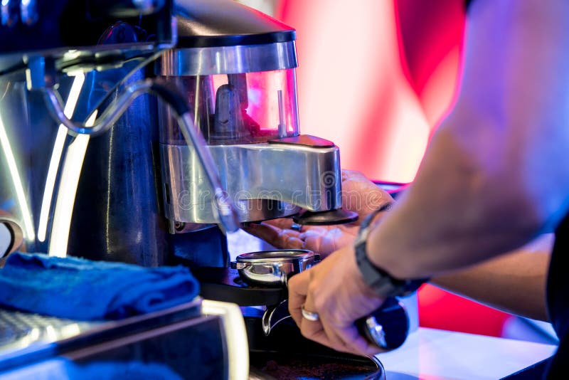 Hand Dosing Fine Ground Coffee from the Grinder Stock Photo Image of