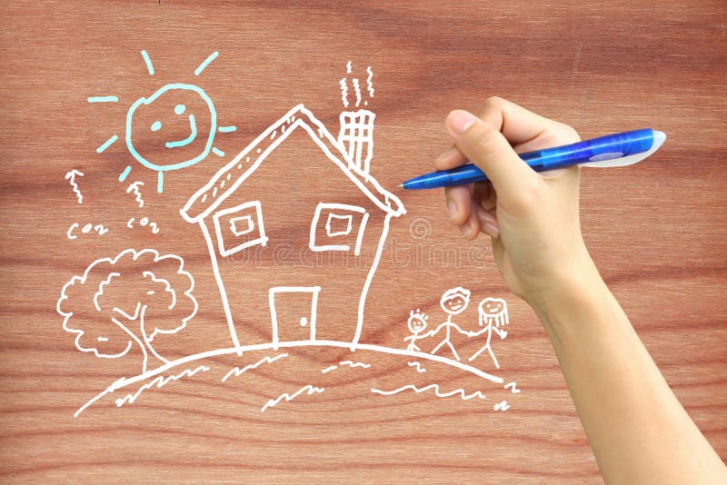 Hand drawing a happy family on wood