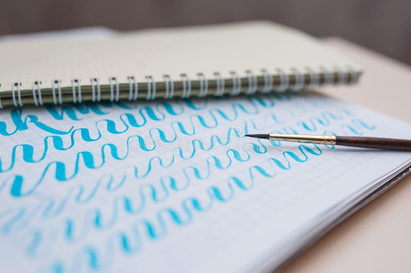 Hand Drawn Lettering Background. Lettering Brush Calligraphy On Paper