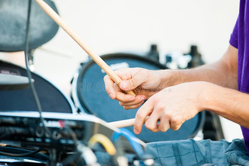 Closeup Of Drummer Hitting Drum During Lion Dance Performance Stock