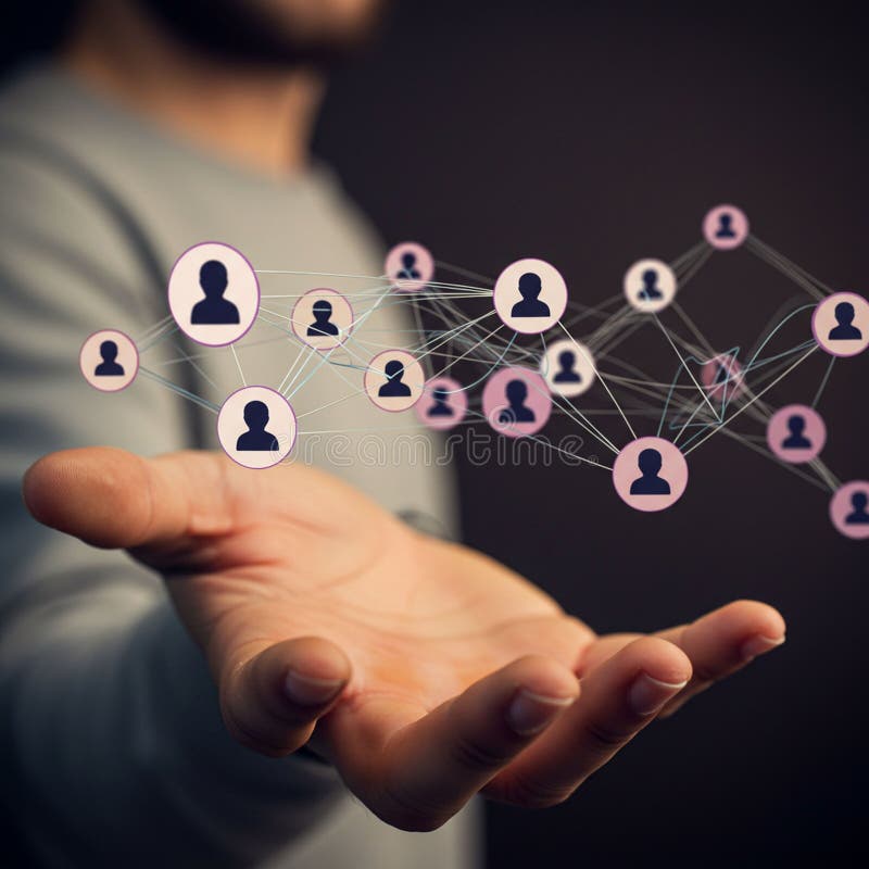 A hand is extended with a digital network of interconnected user icons hovering above it. Each icon features a silhouette within a circle, connected by thin lines, symbolizing communication or social network connectivity. The background is blurred, focusing attention on the hand and the virtual network, suggesting themes of technology and human interaction.
