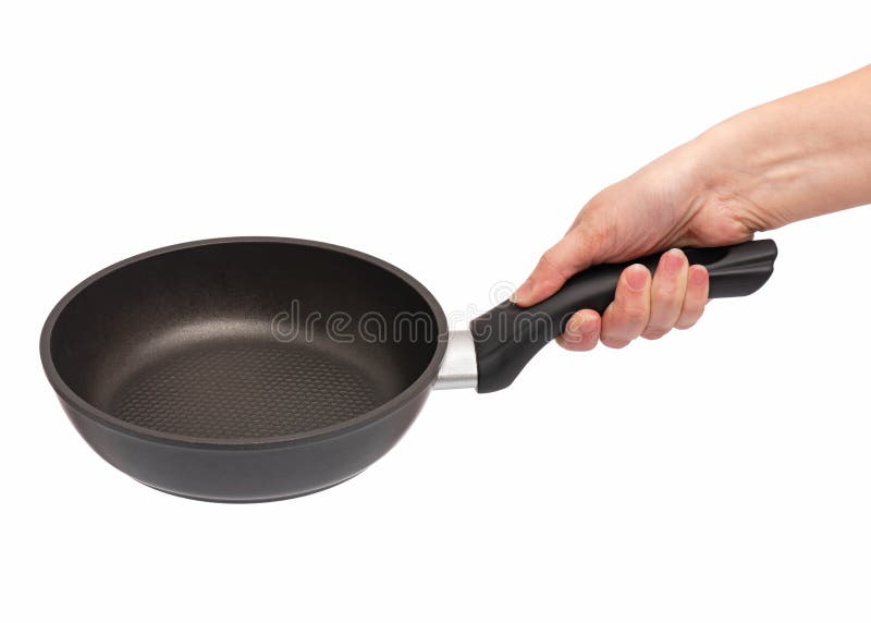 Hand with frying pan stock photo. Image of background - 196762764