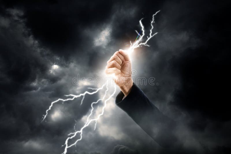 Business woman hand clenching lightning flash concept background. Business woman hand clenching lightning flash concept background