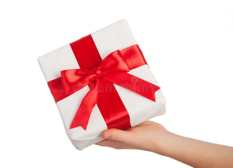 Hand with a gift with a red ribbon isolated