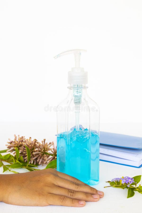 Hand of girl with alcohol gel instant hand sanitizer feeling soft and refreshed royalty free stock photography Hand of girl with alcohol gel instant hand sanitizer feeling soft and refreshed royalty free stock photography