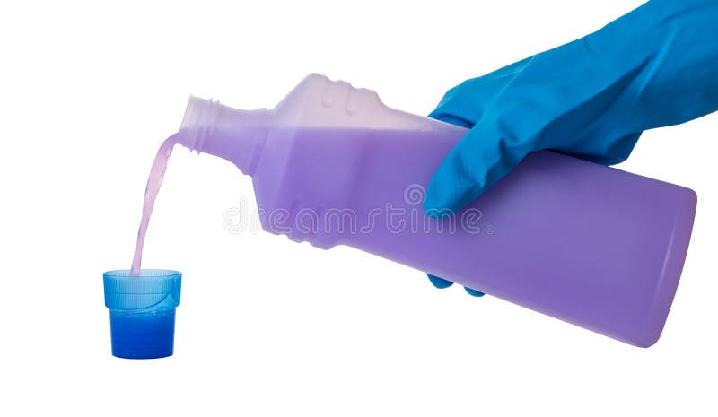 Hand in gloves pour a detergent