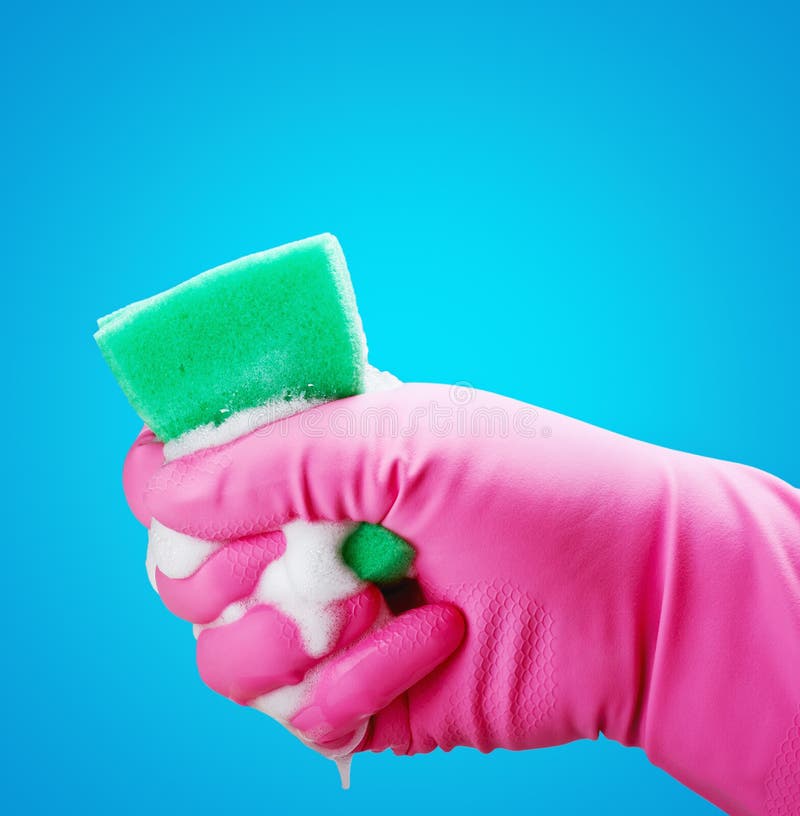 Hand gloves and a sponge stock image. Image of neatness 30757301