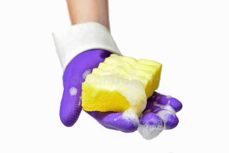 Hand with Gloves Squeezes a Dishwashing Sponge with Foam Stock Photo