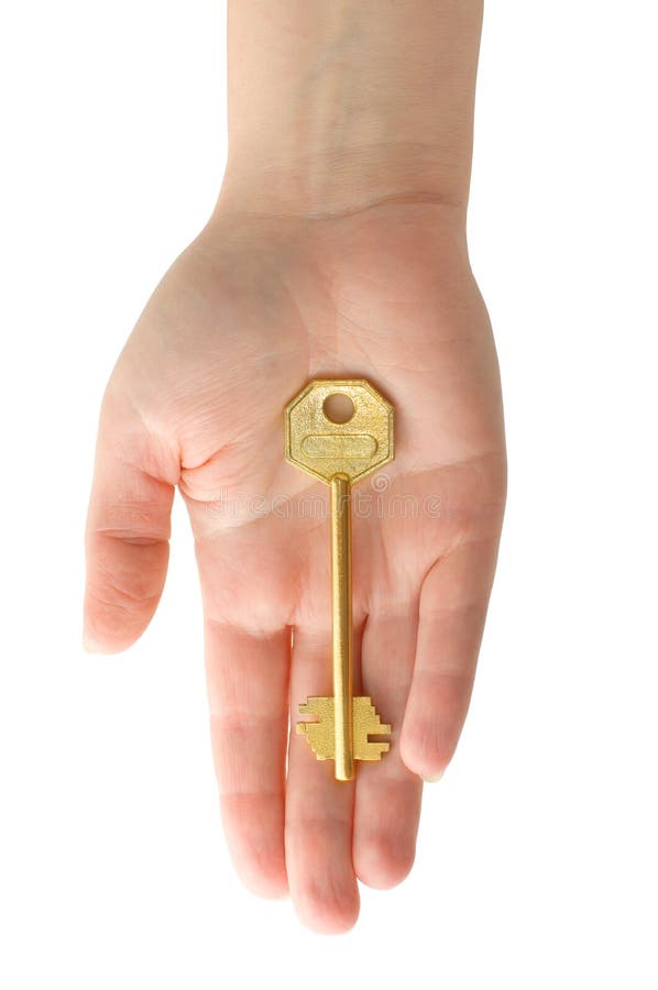 Hand with golden key