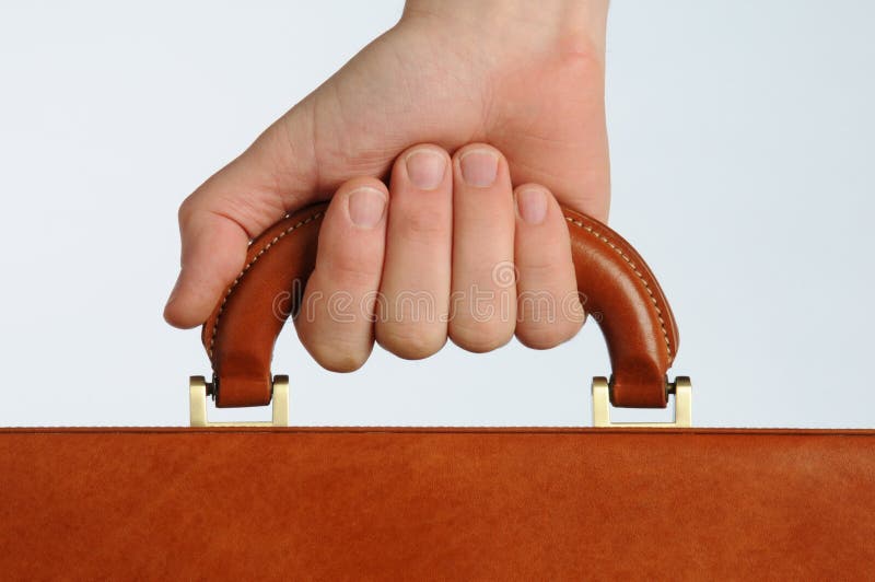 Hand gripping handle stock image. Image of brown, businessman - 26722217