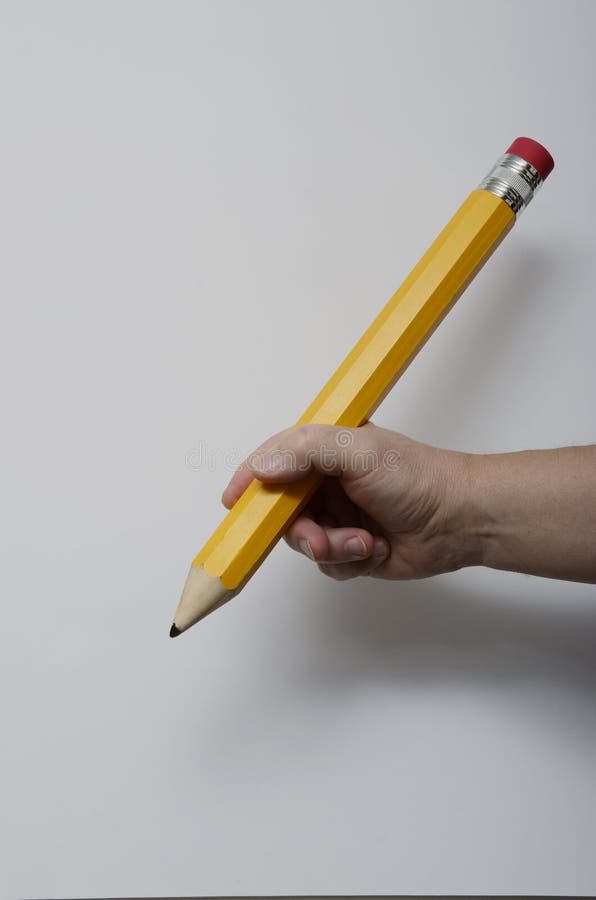 Hand Gripping Large Pencil Stock Photos Free & RoyaltyFree Stock