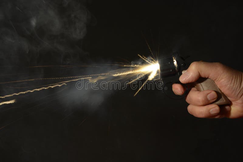 Hand Gun being fired stock image. Image of smoke, handgun 66707493