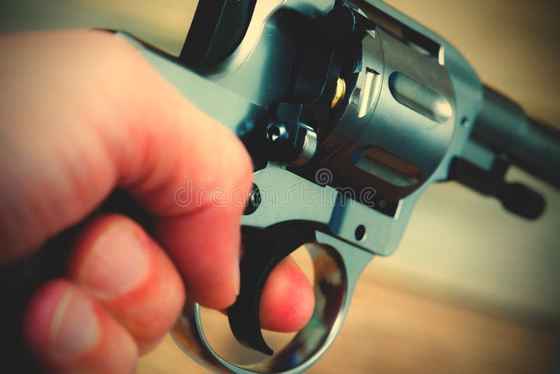 Hand with gun stock photos