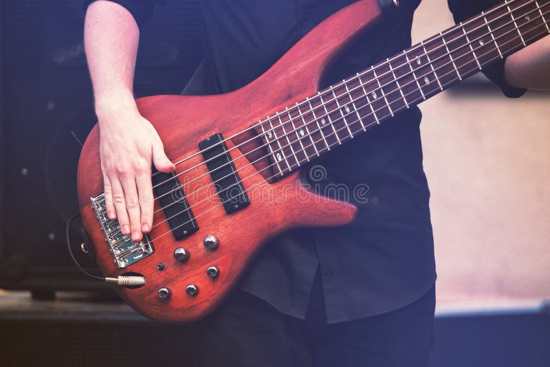 Hand of a Guy Playing the Guitar, Bass Guitar Stock Image Image of