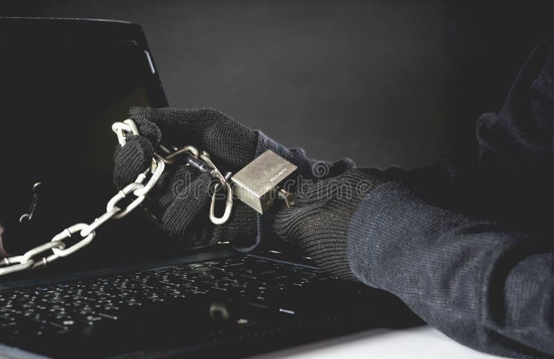 Hand of hacker unlock computer. Dangerous hacker stealing data royalty free stock image Hand of hacker unlock computer. Dangerous hacker stealing data royalty free stock image