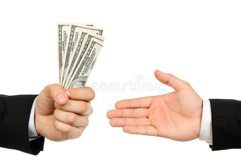 Hand handing over money to another hand royalty free stock images