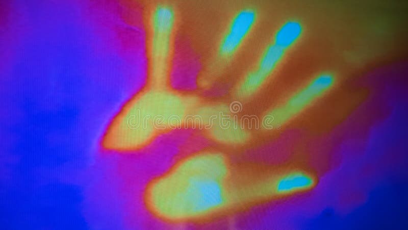 A heat or thermal image of a hand displayed on a screen. The blue color indicates colder areas while the red and yellow colors indicate the warmer and hot areas. A heat or thermal image of a hand displayed on a screen. The blue color indicates colder areas while the red and yellow colors indicate the warmer and hot areas.