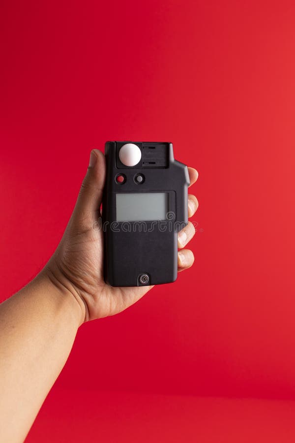 Hand Held Light Measurement with Photometer Exposure Meter Stock Image